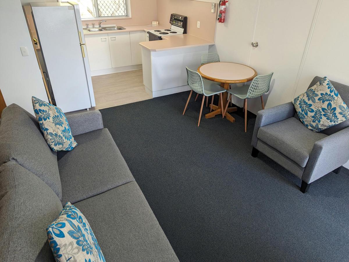 One bedroom apartment lounge and kitchen