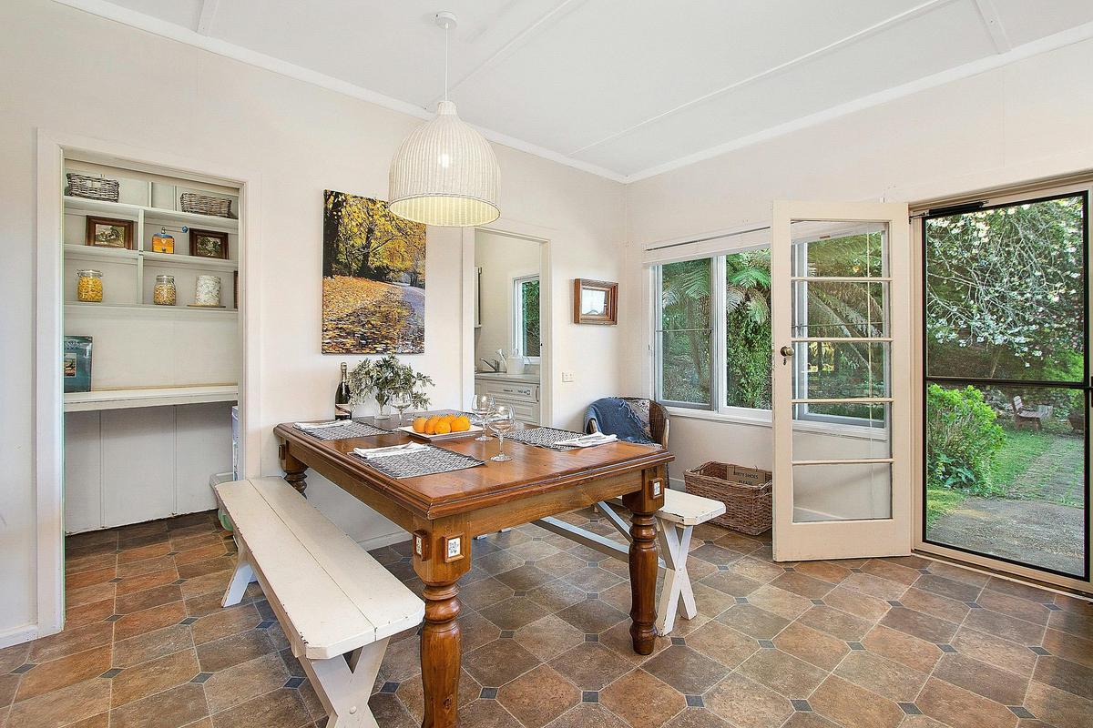 Family dining opening to rear yard