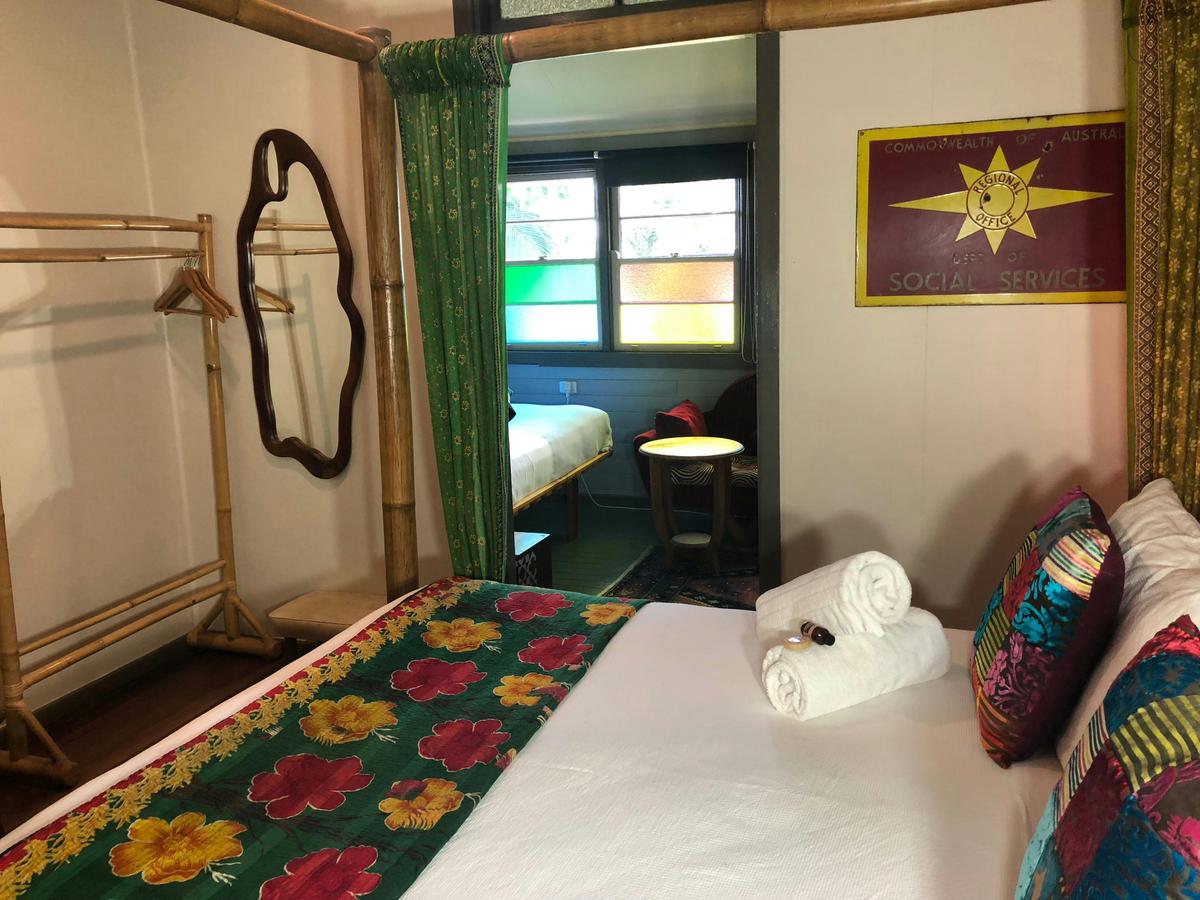 Room 3 has a four poster Queen bed & a King Single.