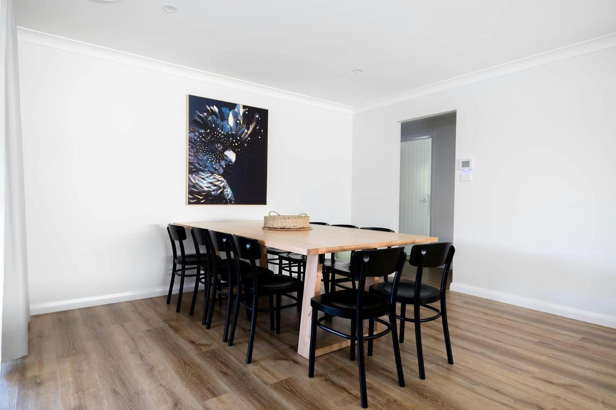 Dining table and chairs at Ideal Family Home