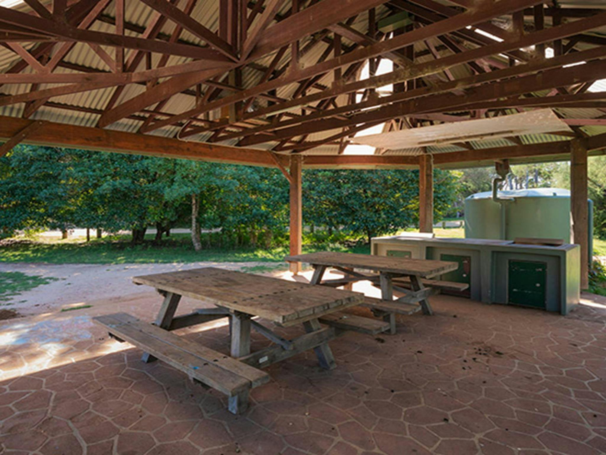 Picnic and barbecue facilities at Hobart Beach campground, Bournda National Park. Photo: Daniel