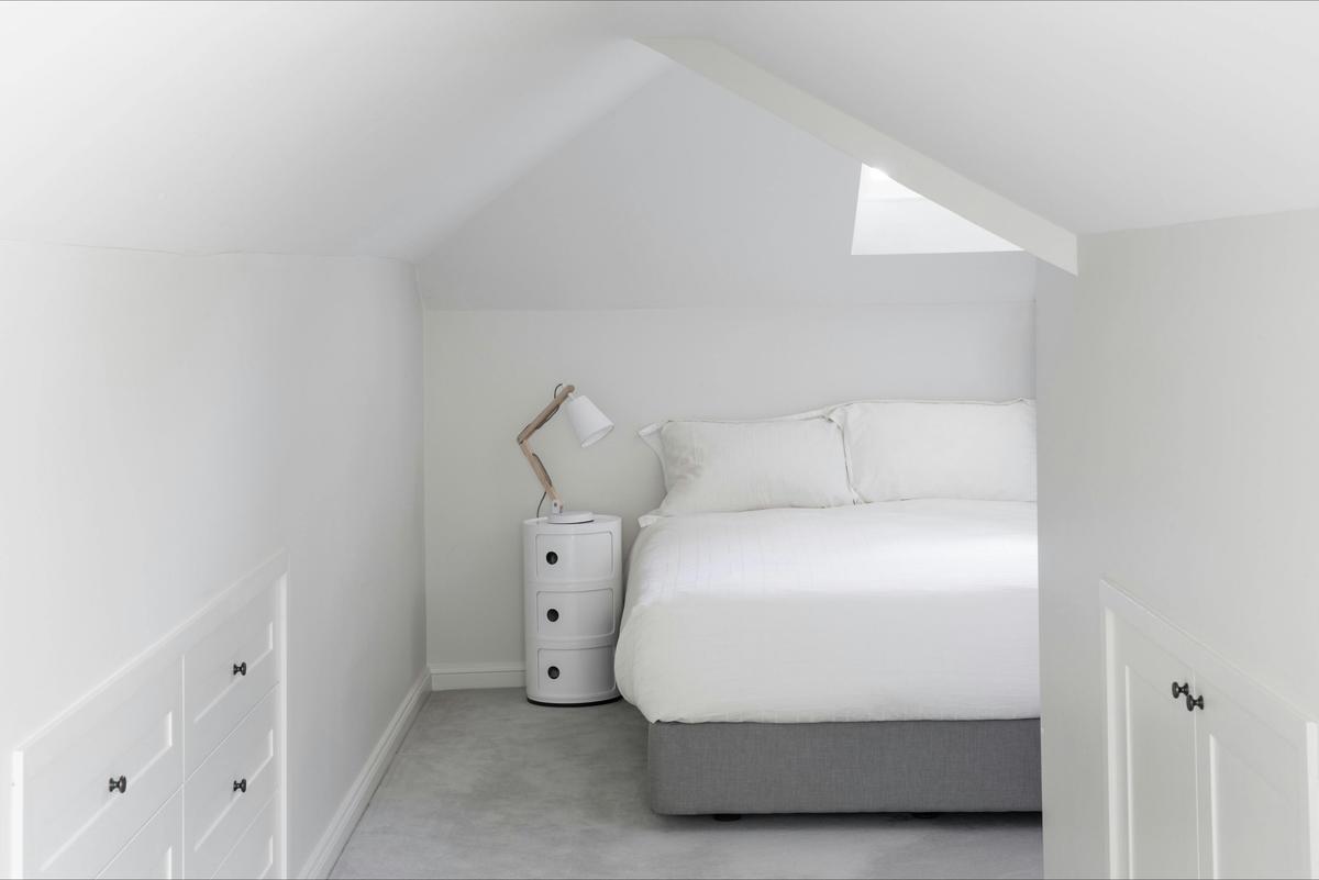 King bed under roof window