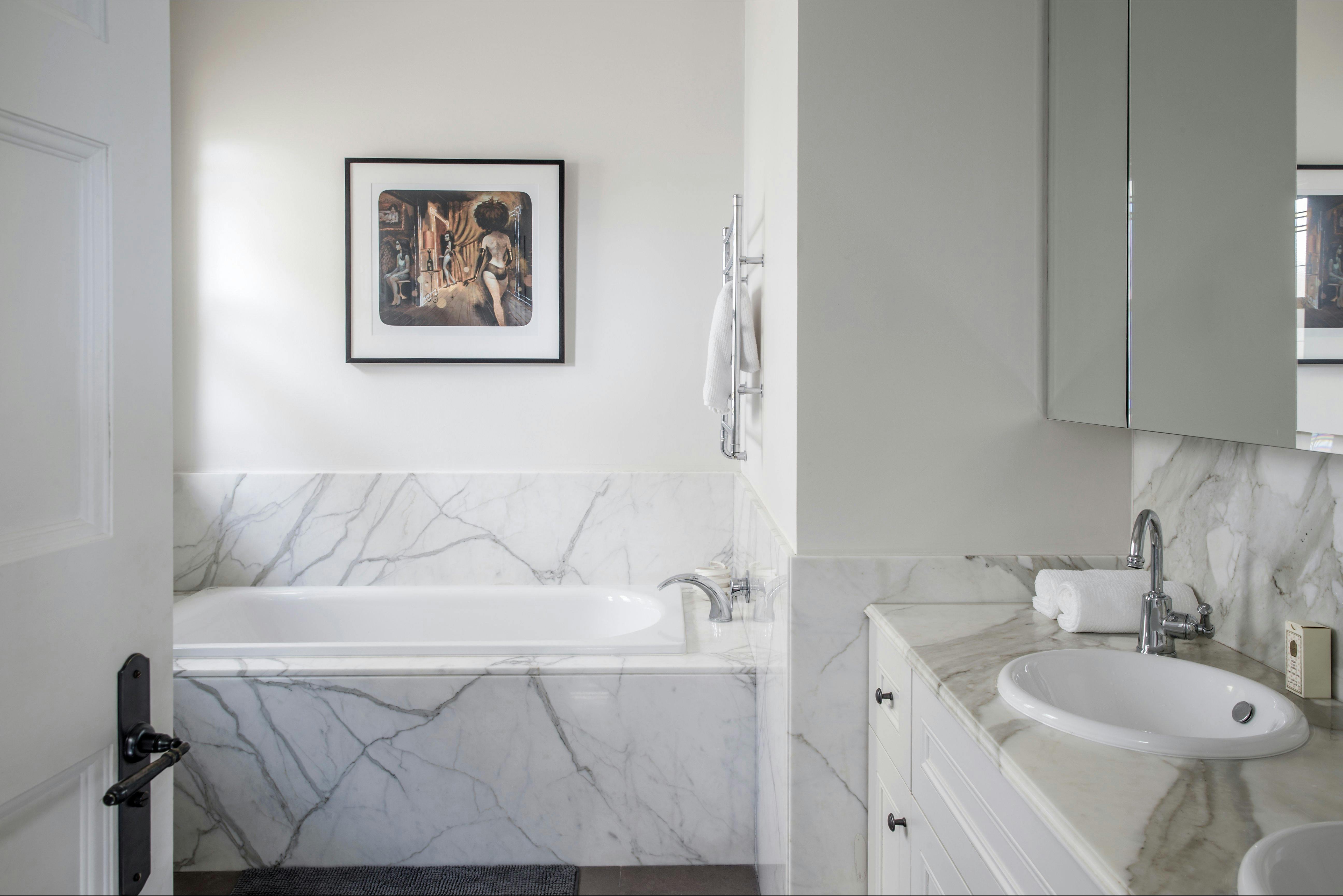 Marble bathroom with bathtub