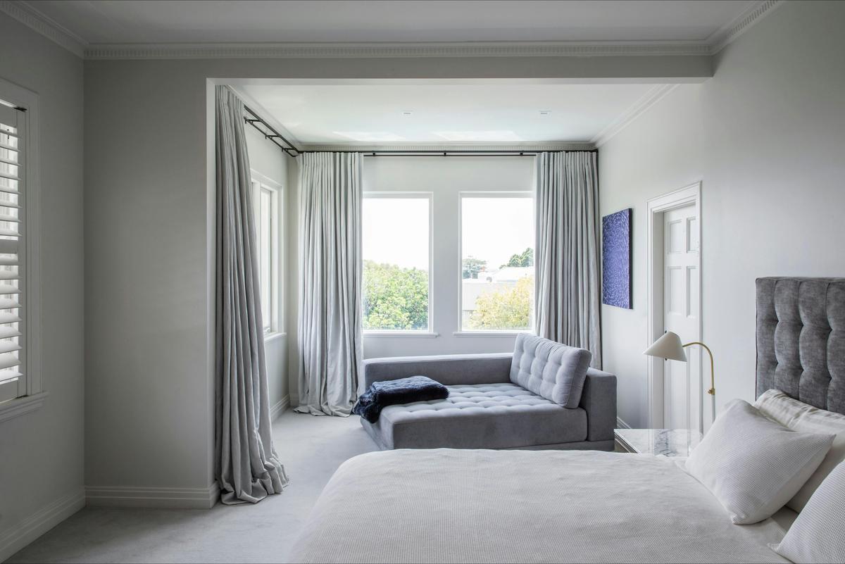 Large bedroom with double bed and cot bed