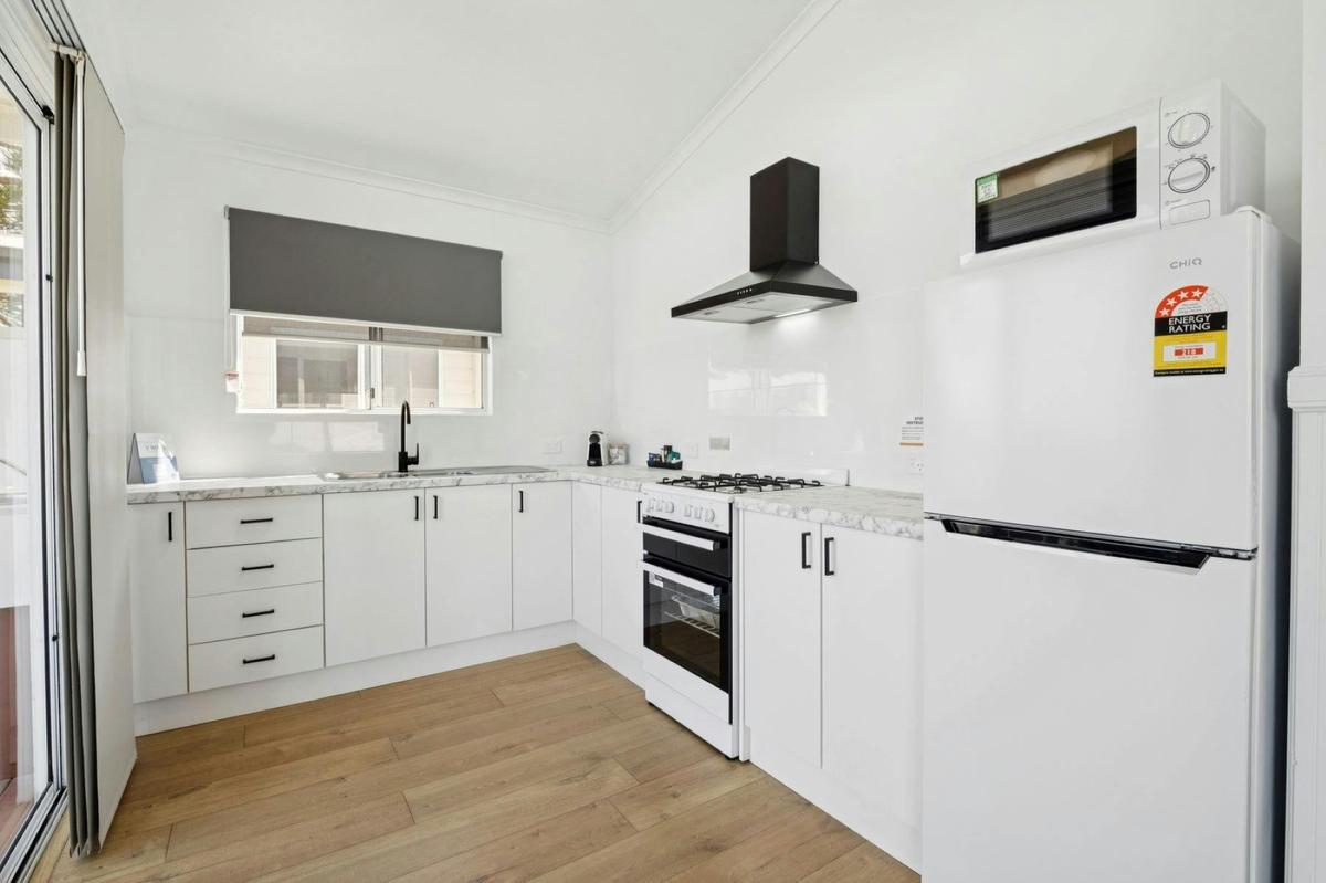 2 Bedroom Waterfront Deluxe Spa Cabin Kitchen