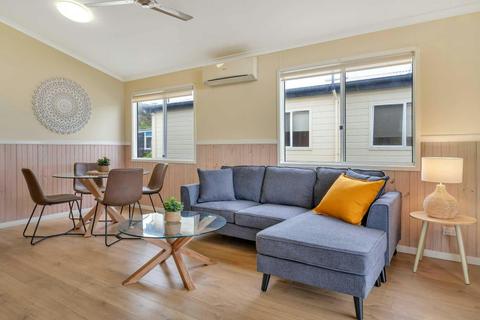 Ingenia Holidays Nambucca Heads - 2 Bedroom Waterfront Deluxe Spa Cabin Living Room