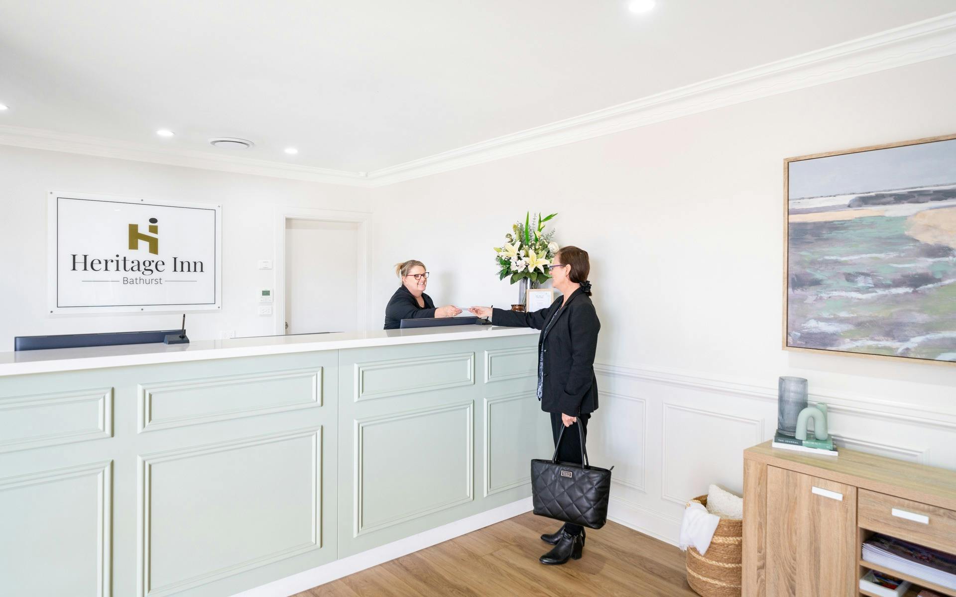 check in at Heritage Inn Reception