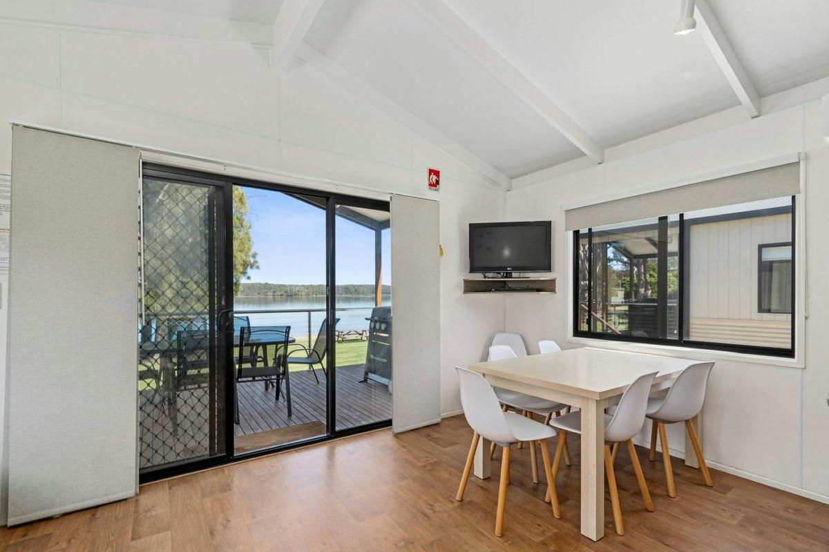 Deluxe Waterfront Cabin Dining