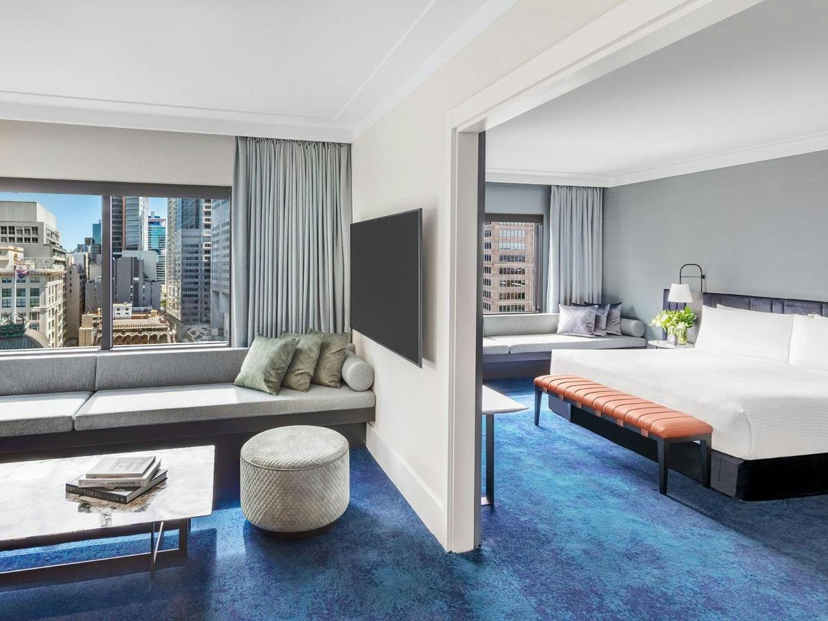 Living and sleeping space with views of Sydney skyline