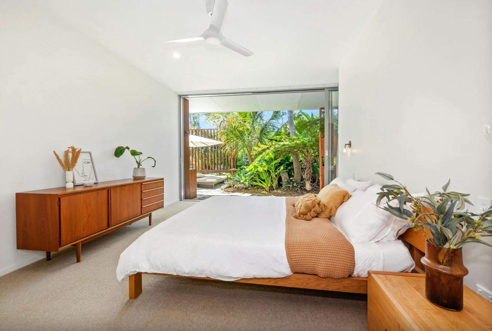 Master bedroom with access to back entertaining area