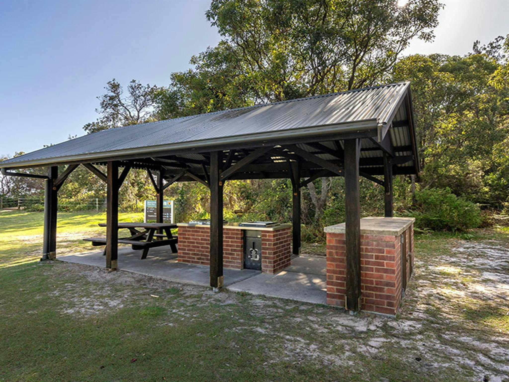 Sheltered barbecues at Illaroo campground. Credit: John Spencer &copy; DCCEEW