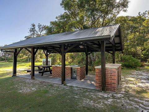 Sheltered barbecues at Illaroo campground. Credit: John Spencer &copy; DCCEEW