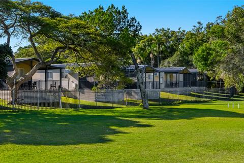 Exterior & Deck of Waterfront Cabin at Iluka Riverside Holiday Park