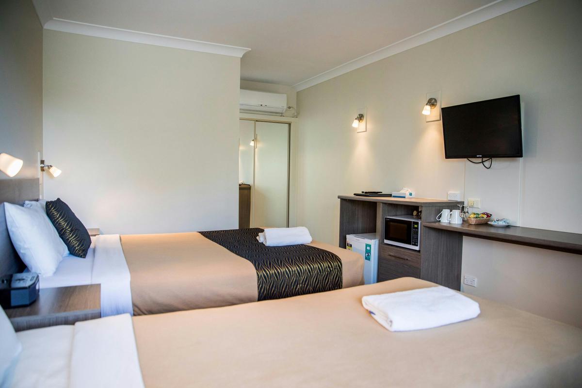 Two beds in a room