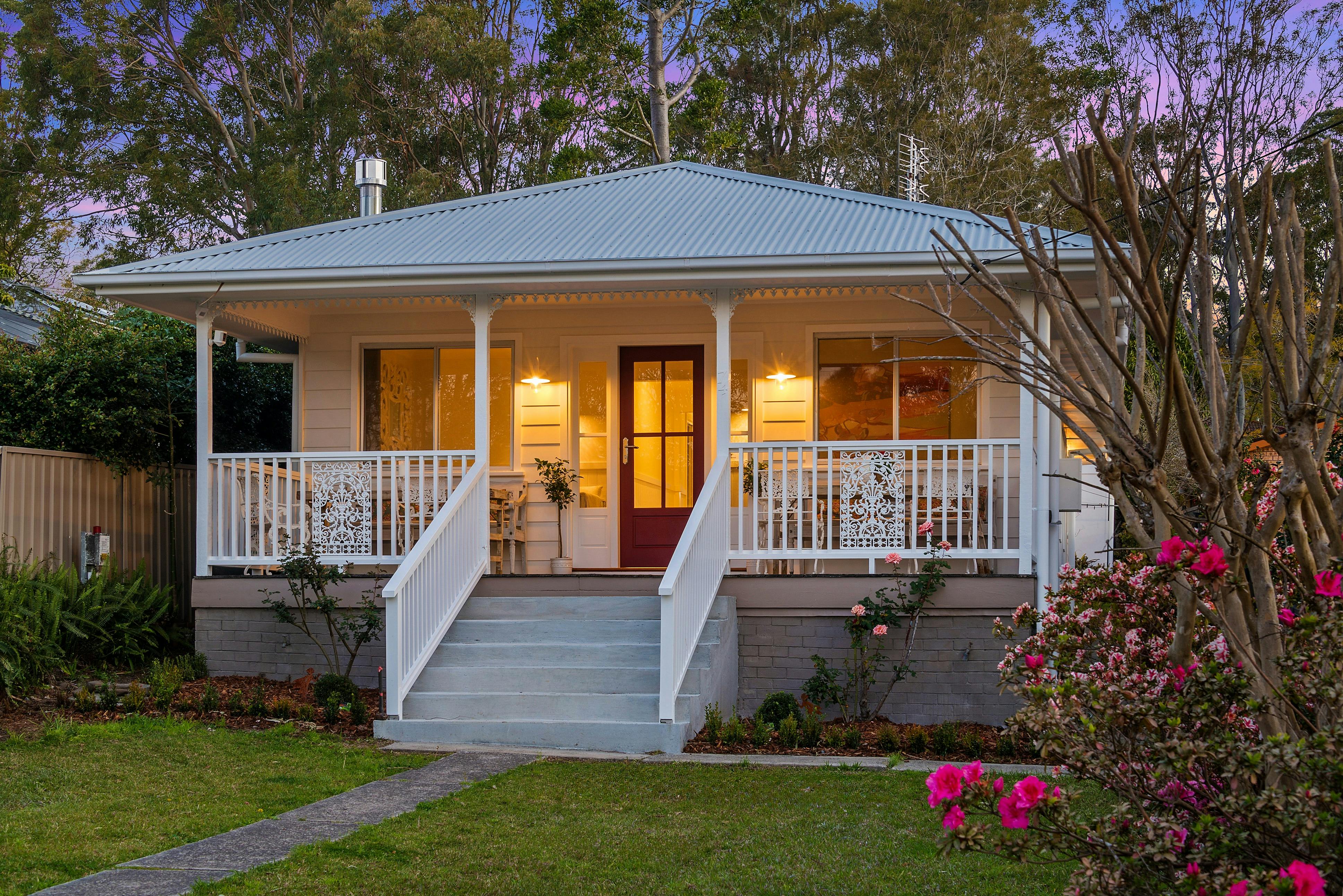 Lady Rose Cottage as seen from the street with front garden and entry