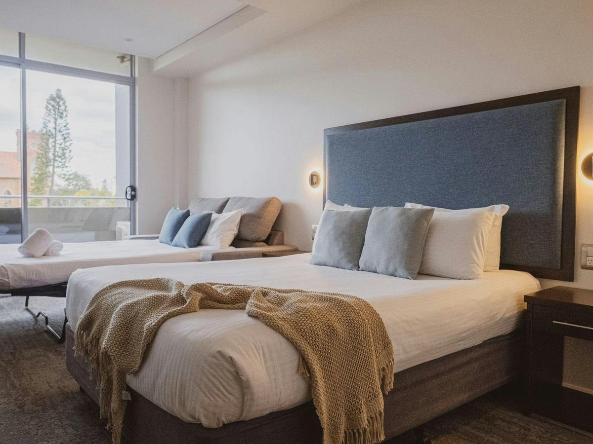 Queen Room with Sofa and Balcony