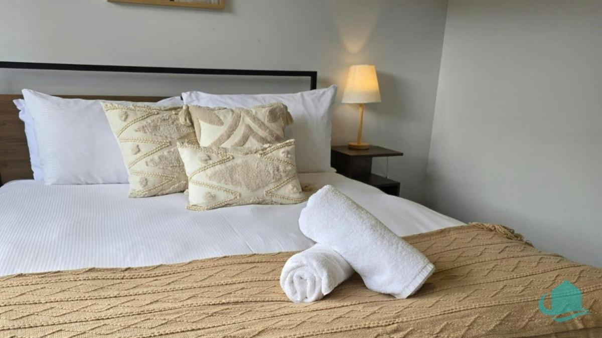 Queen bed in master bedroom