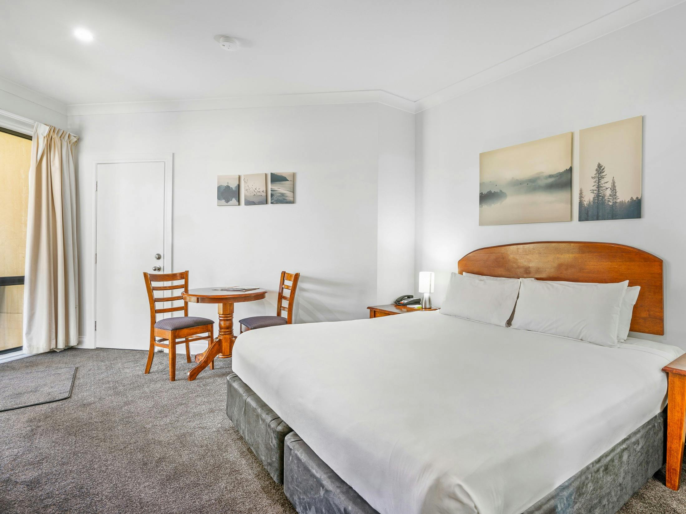 Relax in light-filled rooms with modern comforts