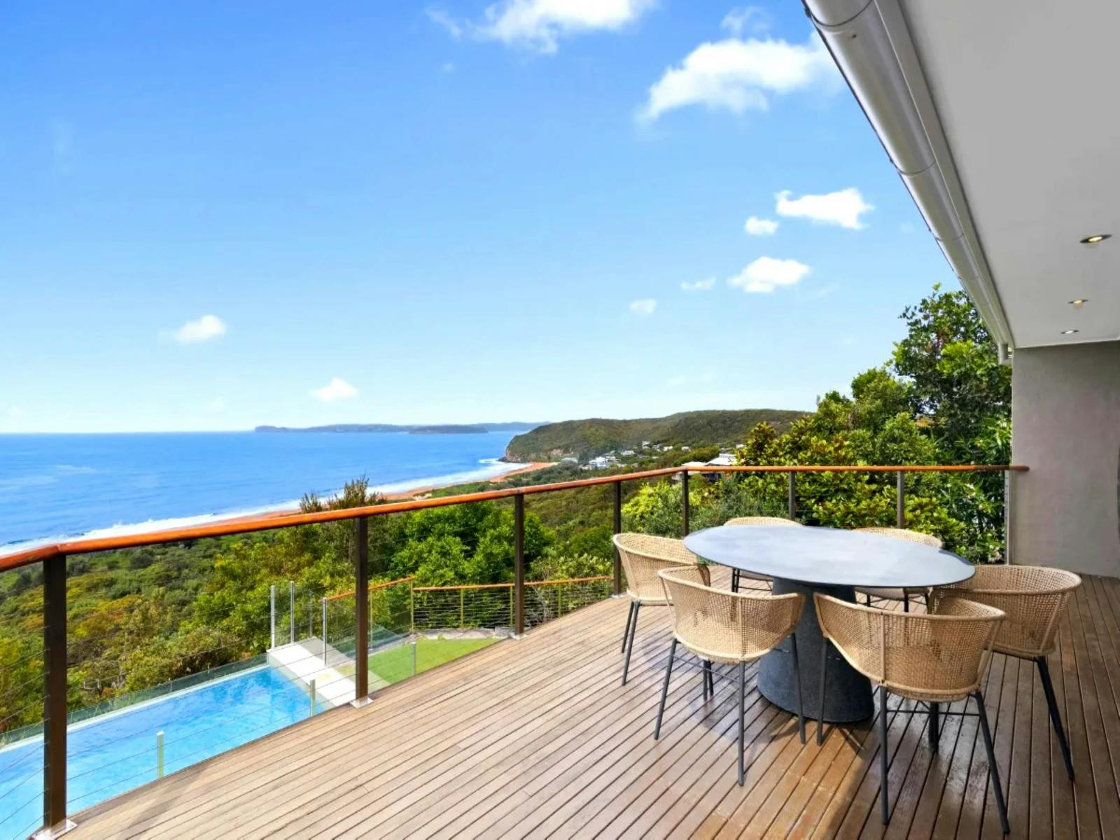 Ocean-facing decks, lush level gardens, and sparkling