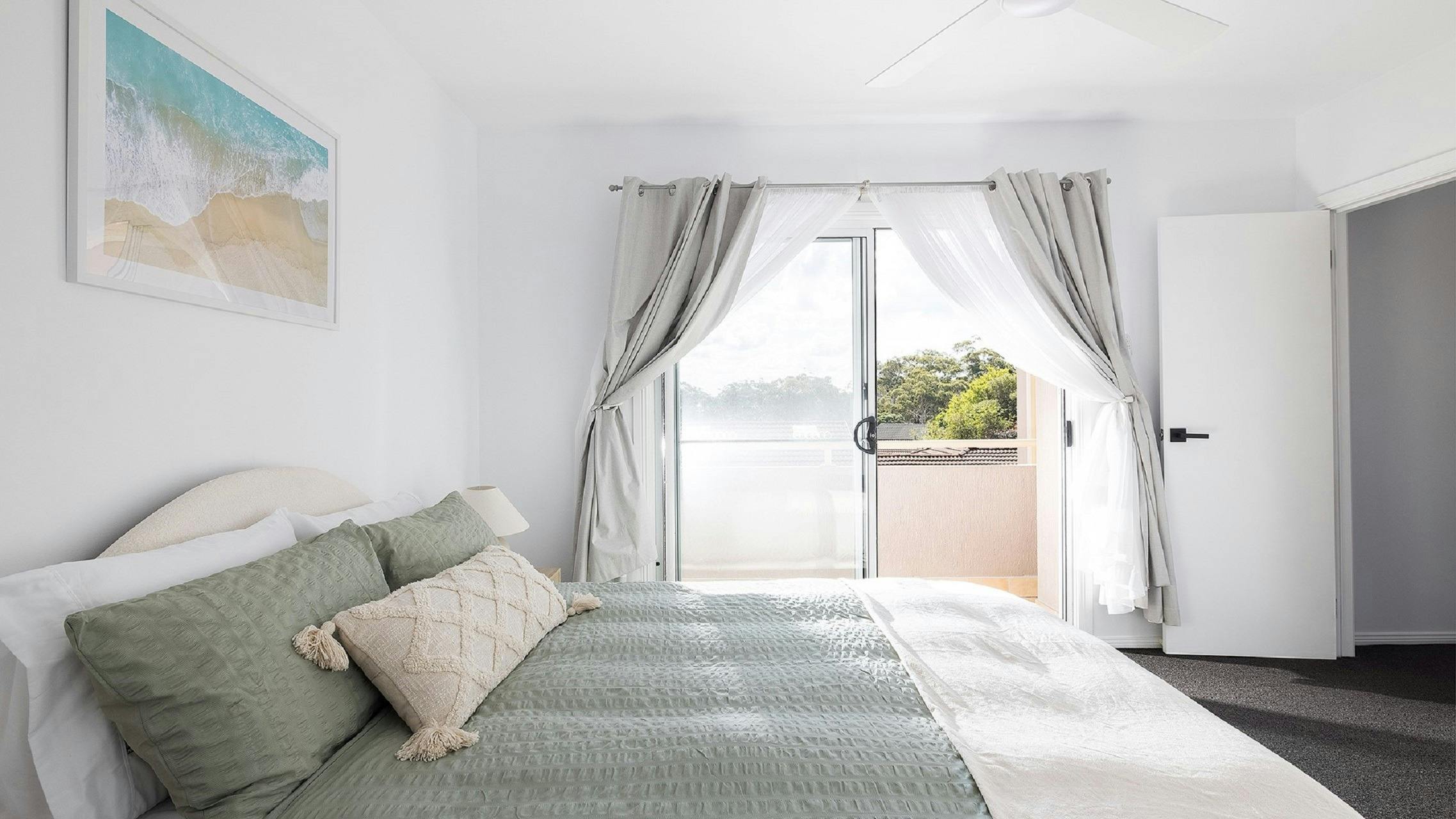 Master bedroom with queen bed and ensuite bathroom