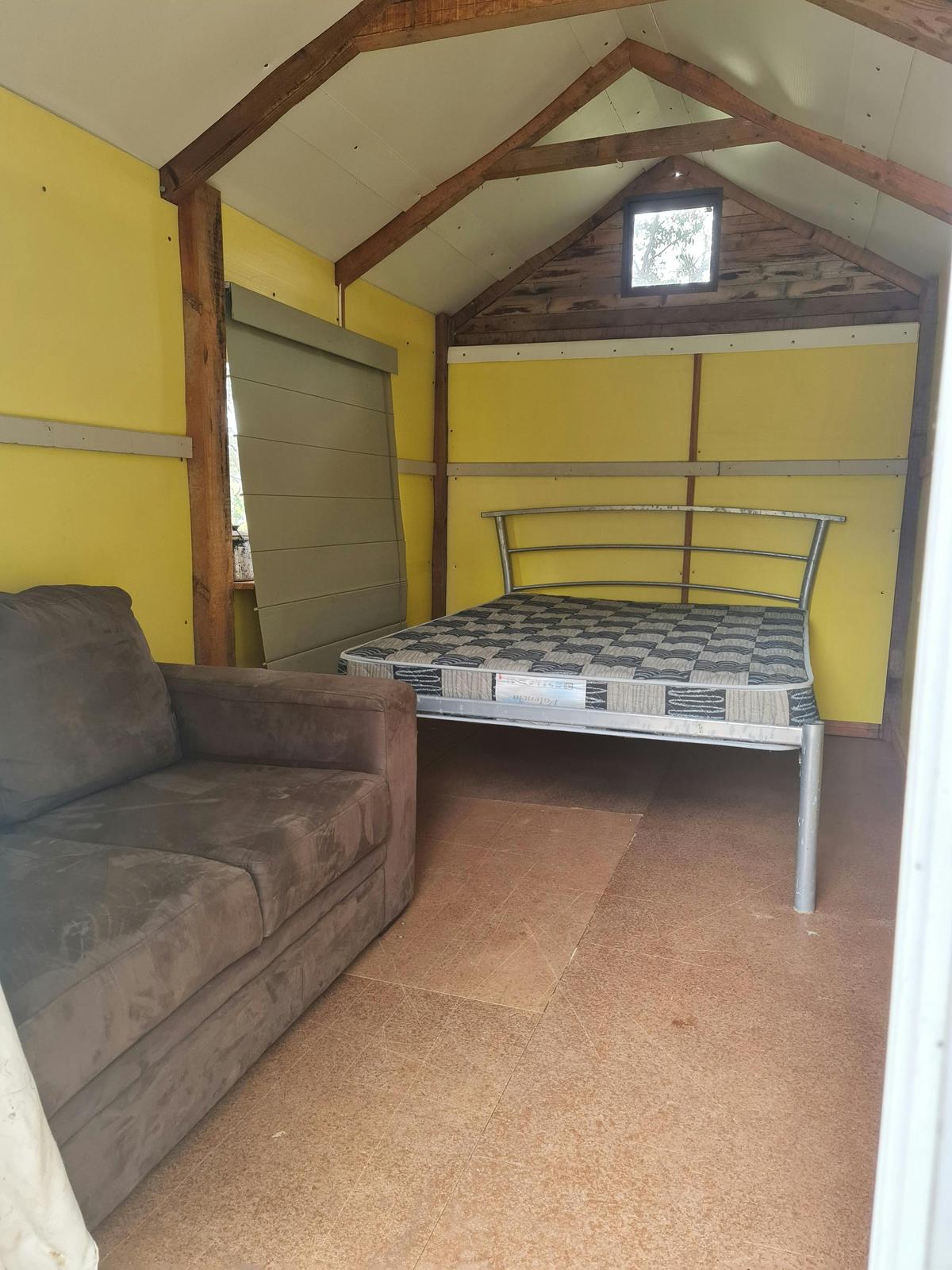 Double bed inside hootchie hut