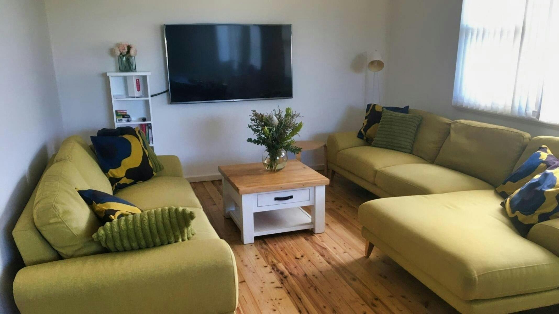 lounge room with wall mounted TV