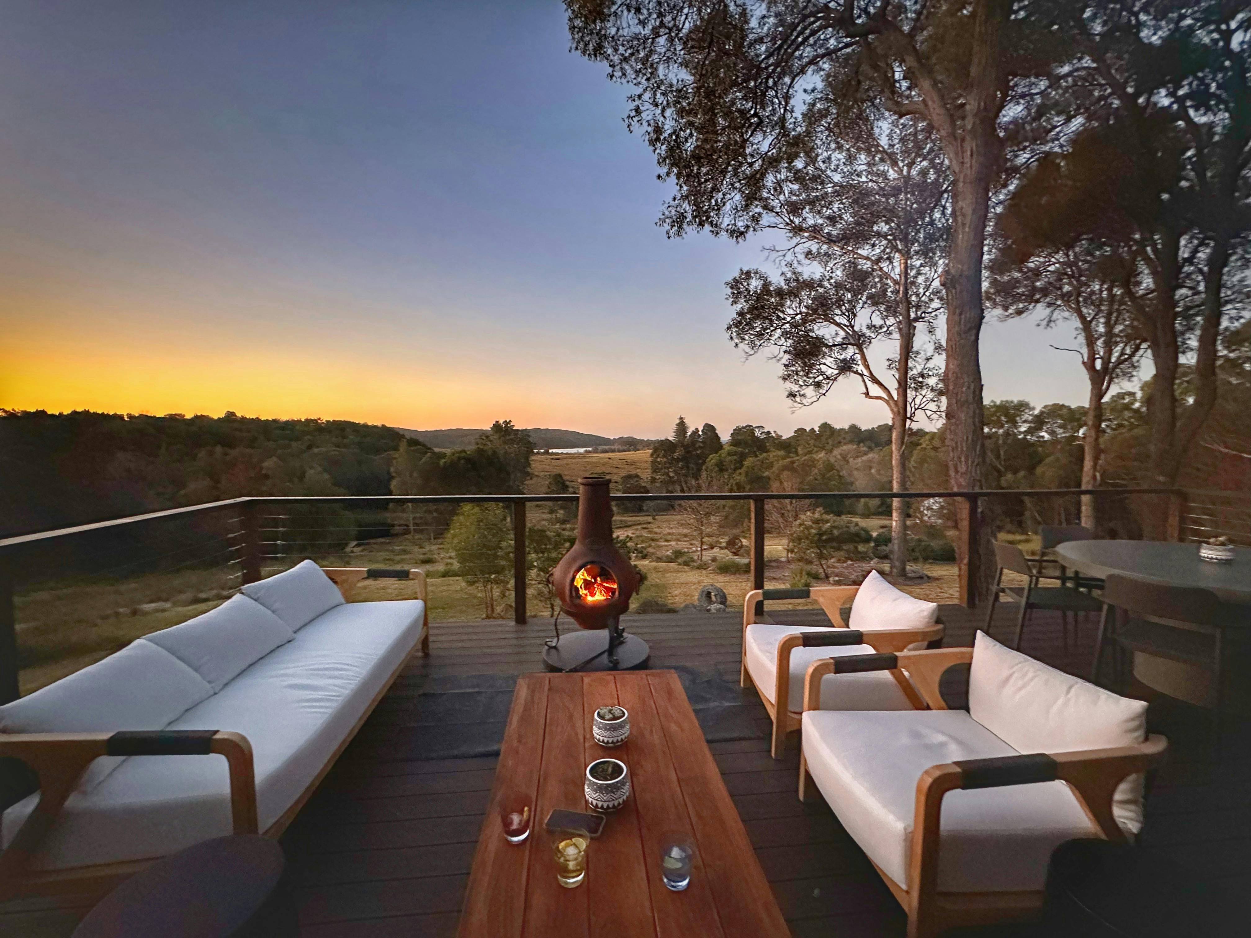 Watch the stars beside the fire on the retreat house deck
