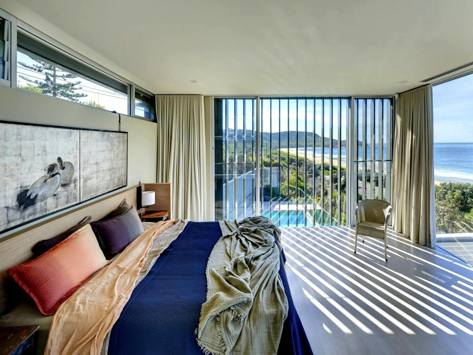 Spacious king bedroom with scenic views and a private ensuite bathroom