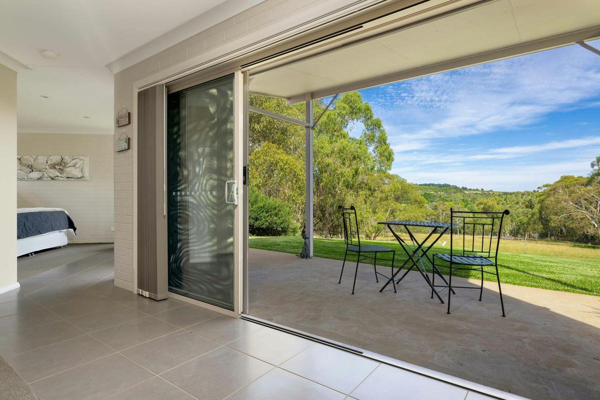 View from dining area to bedroom and patio