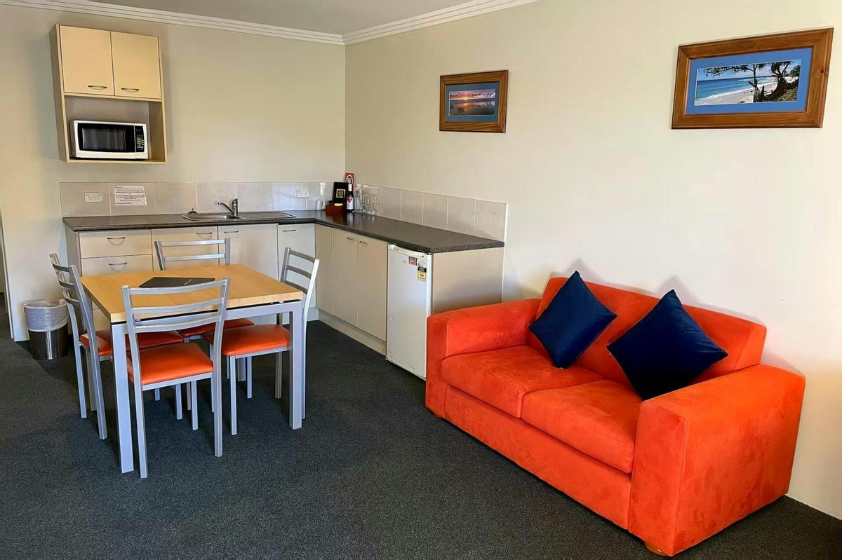Our Family Room has a kitchenette . The  bathroom and toilet are separated.