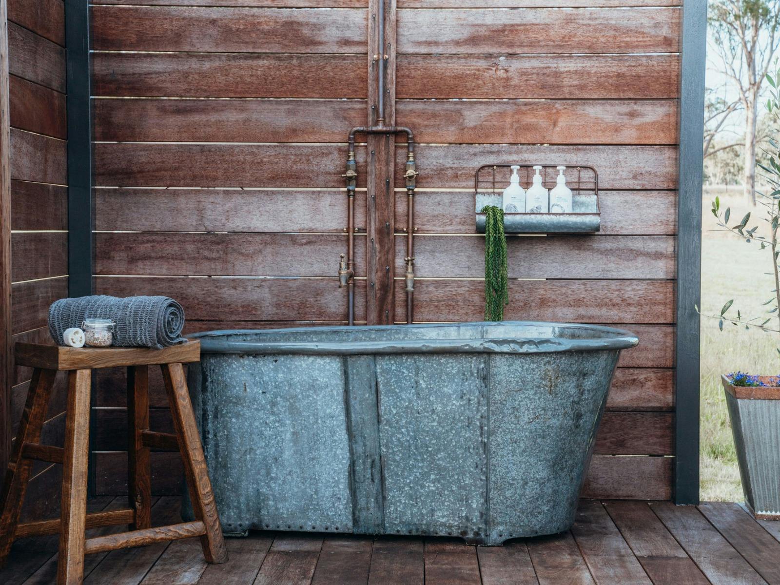 Bathe under the stars in our vintage French tin tub at Captain Moonlite
