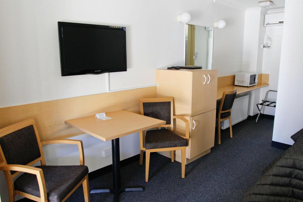 Seating, desk and television