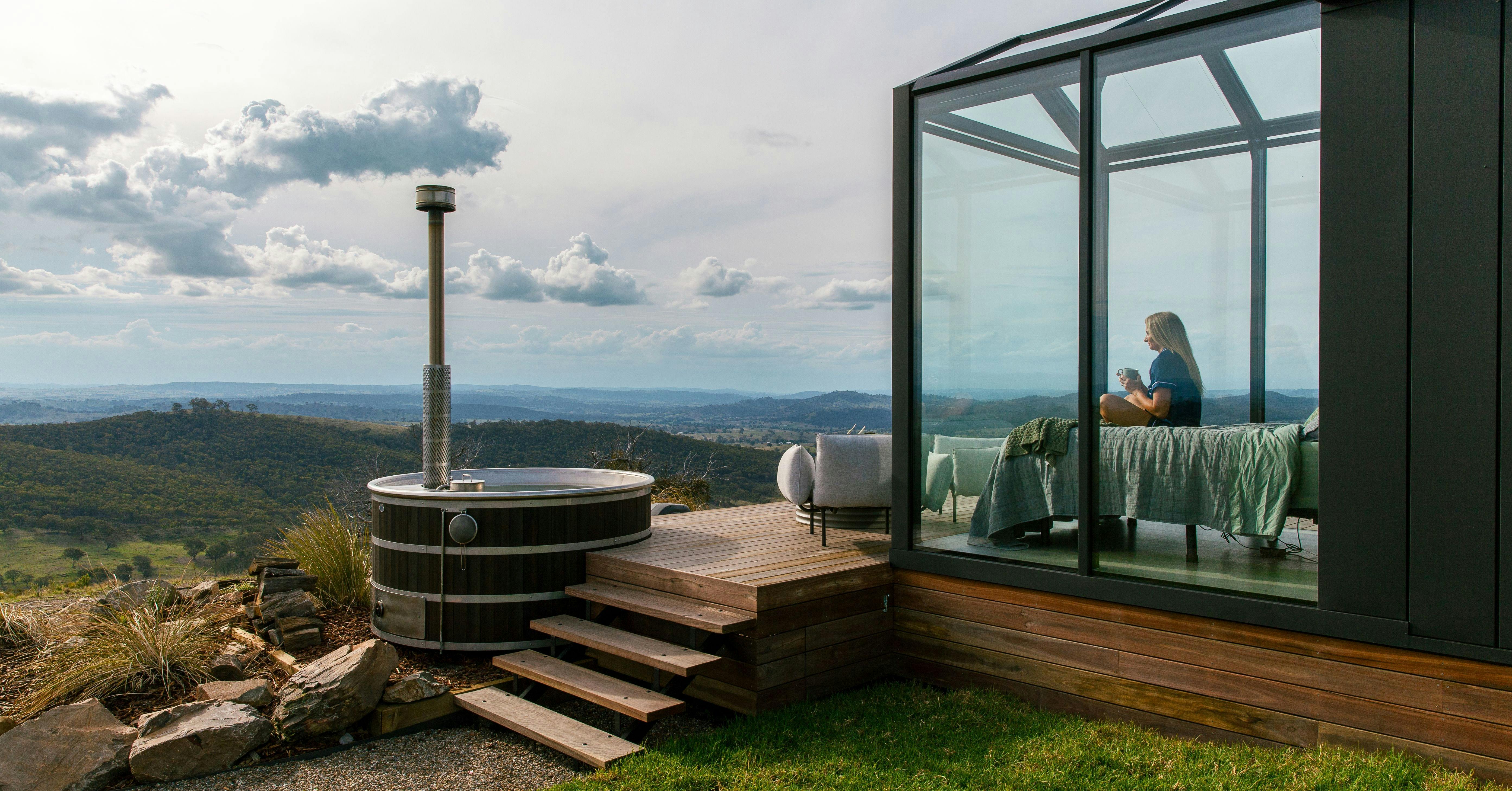 Outdoor Hot tub and glass cabin at Oakhill Estate