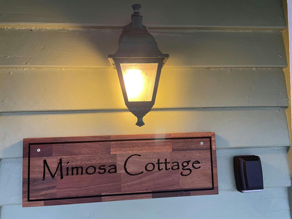 Mimosa Cottage sign