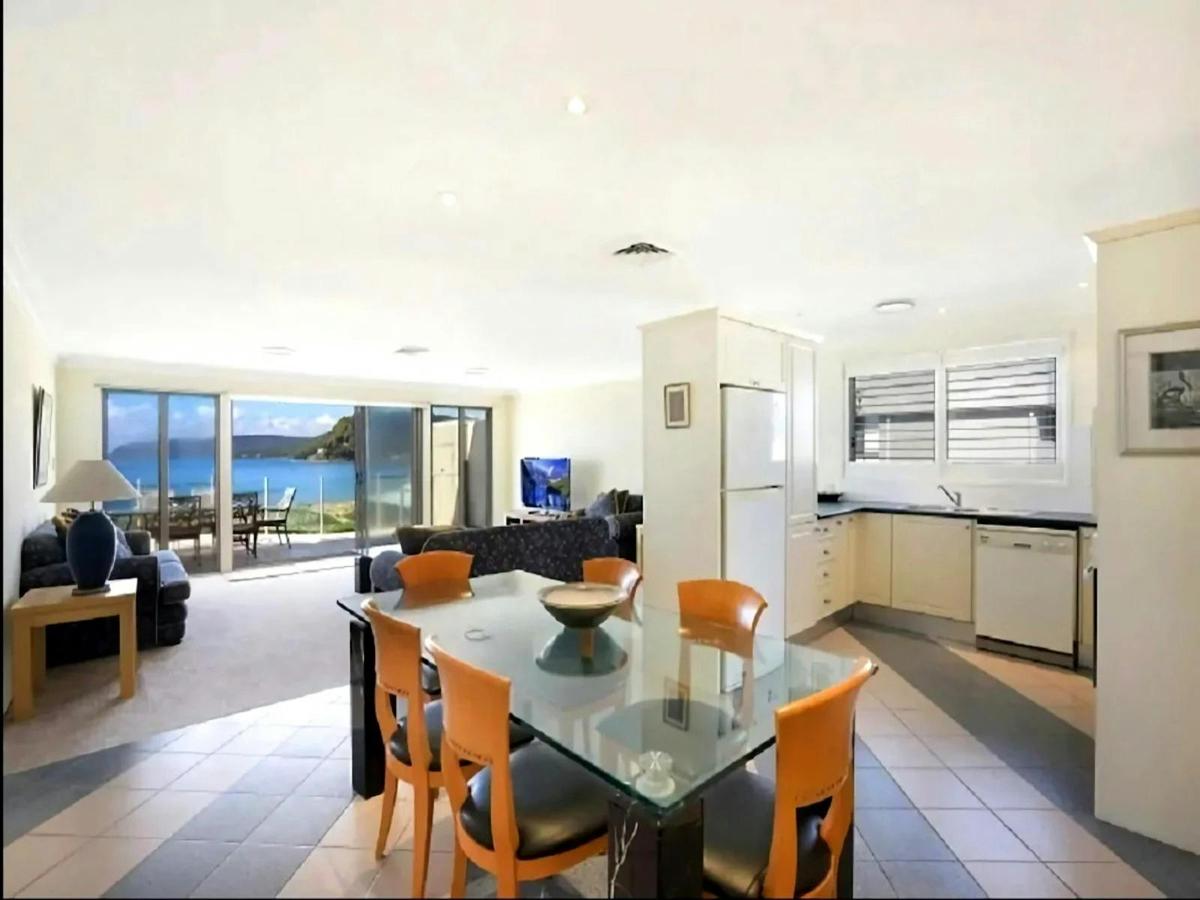 Fully equipped kitchen with modern appliances and ample workspace