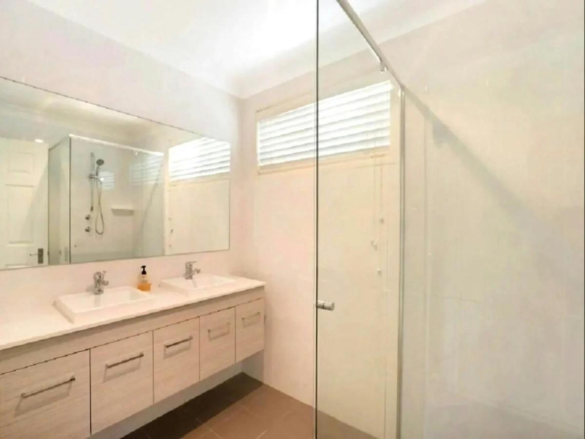 Ensuite bathroom with modern amenities and elegant design