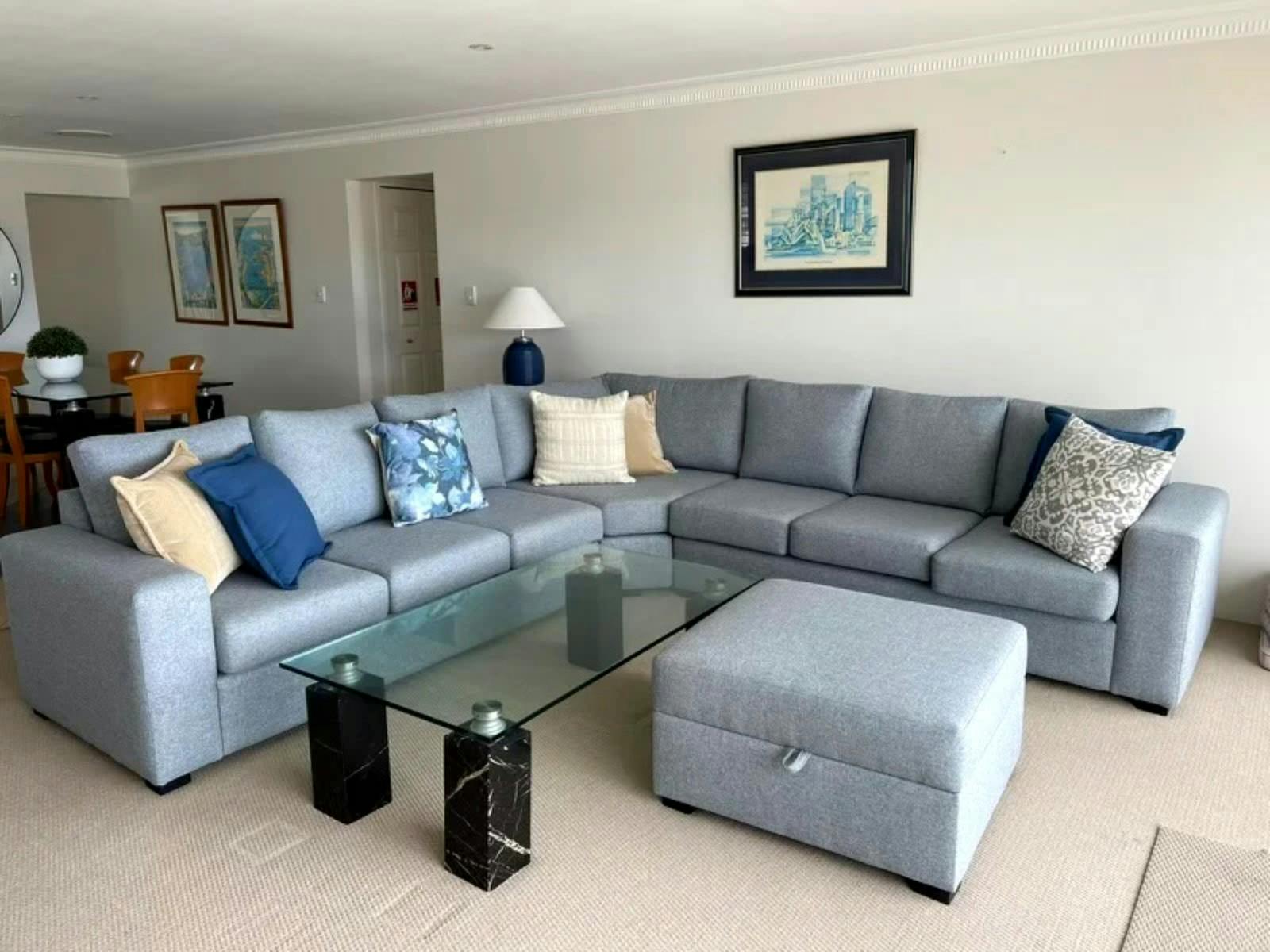 Spacious living area equipped with a TV and DVD player for entertainment