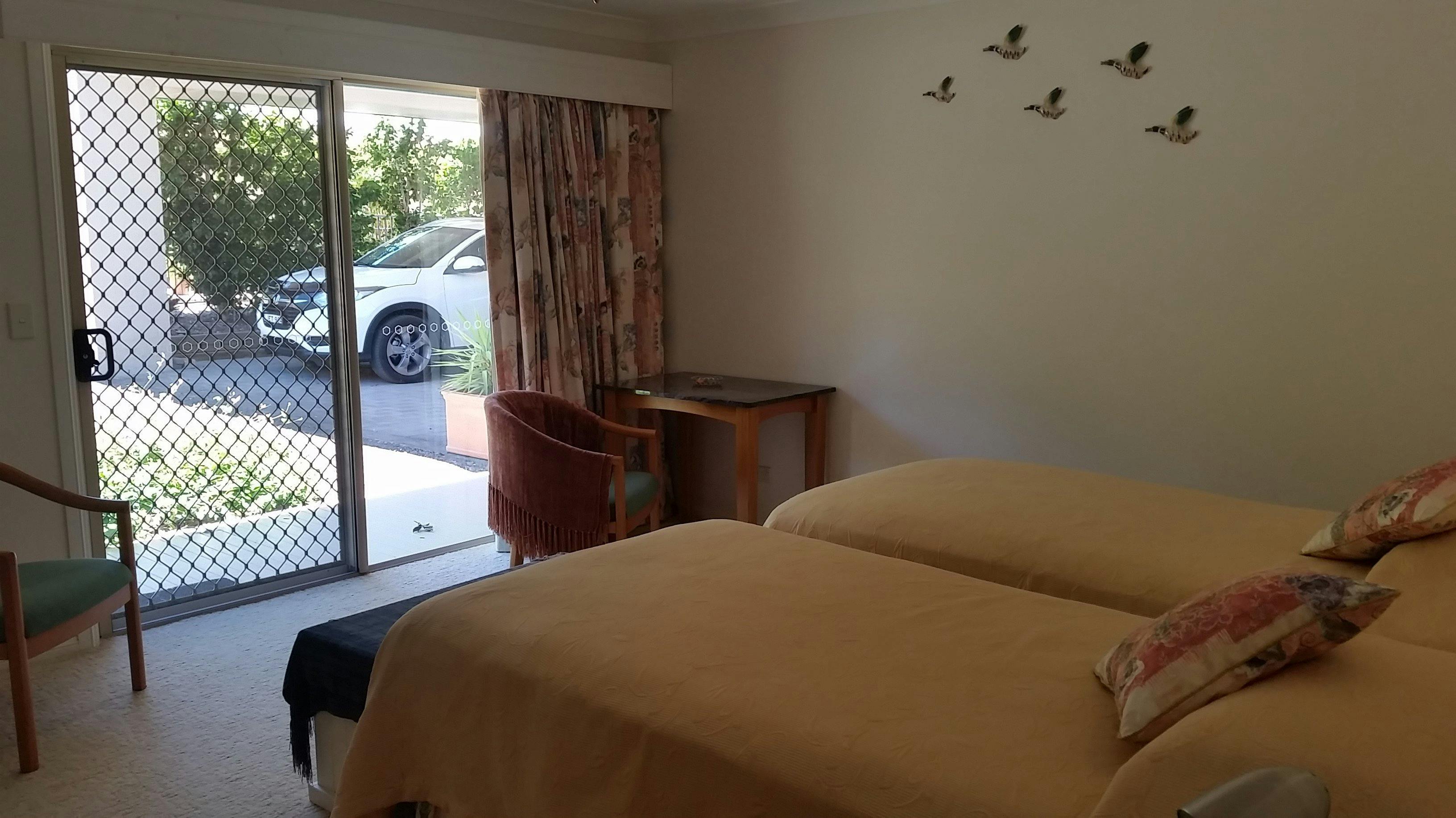 Super comfy king single beds guarantee a great nights sleep.  External access to garden and pool.