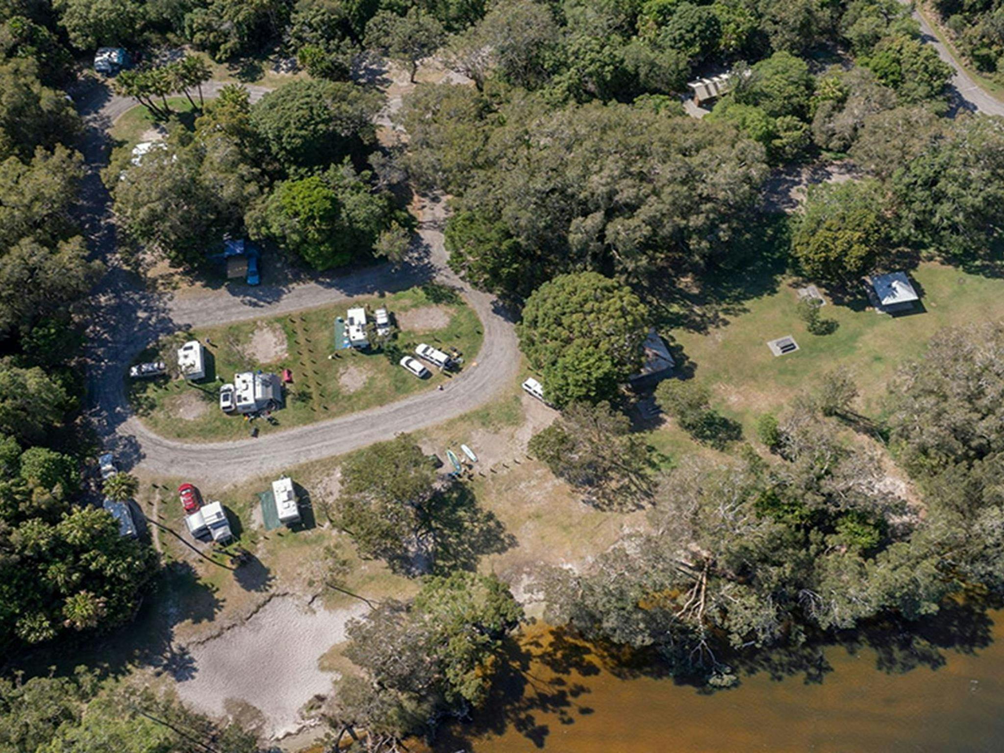 Aerial view of Mungo Brush campground and nearby Myall Lake in Myall Lakes National Park. Credit: