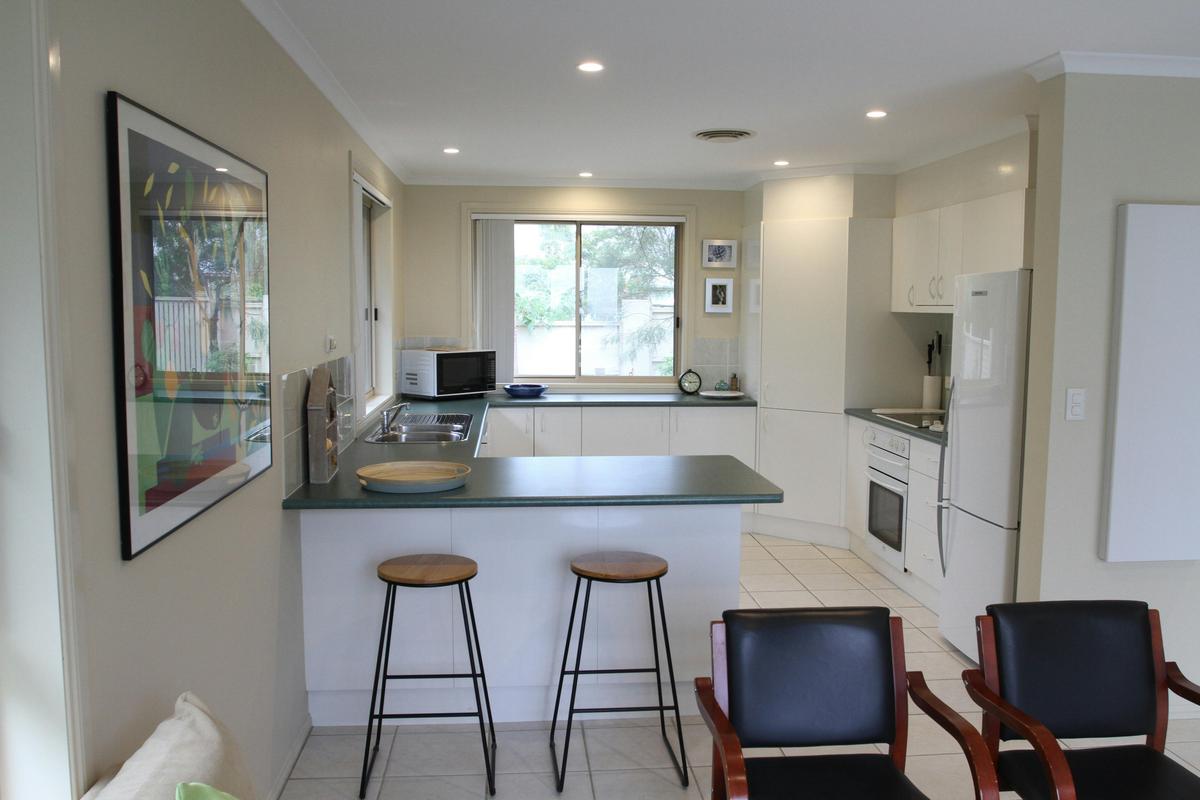 Full kitchen with dish washer