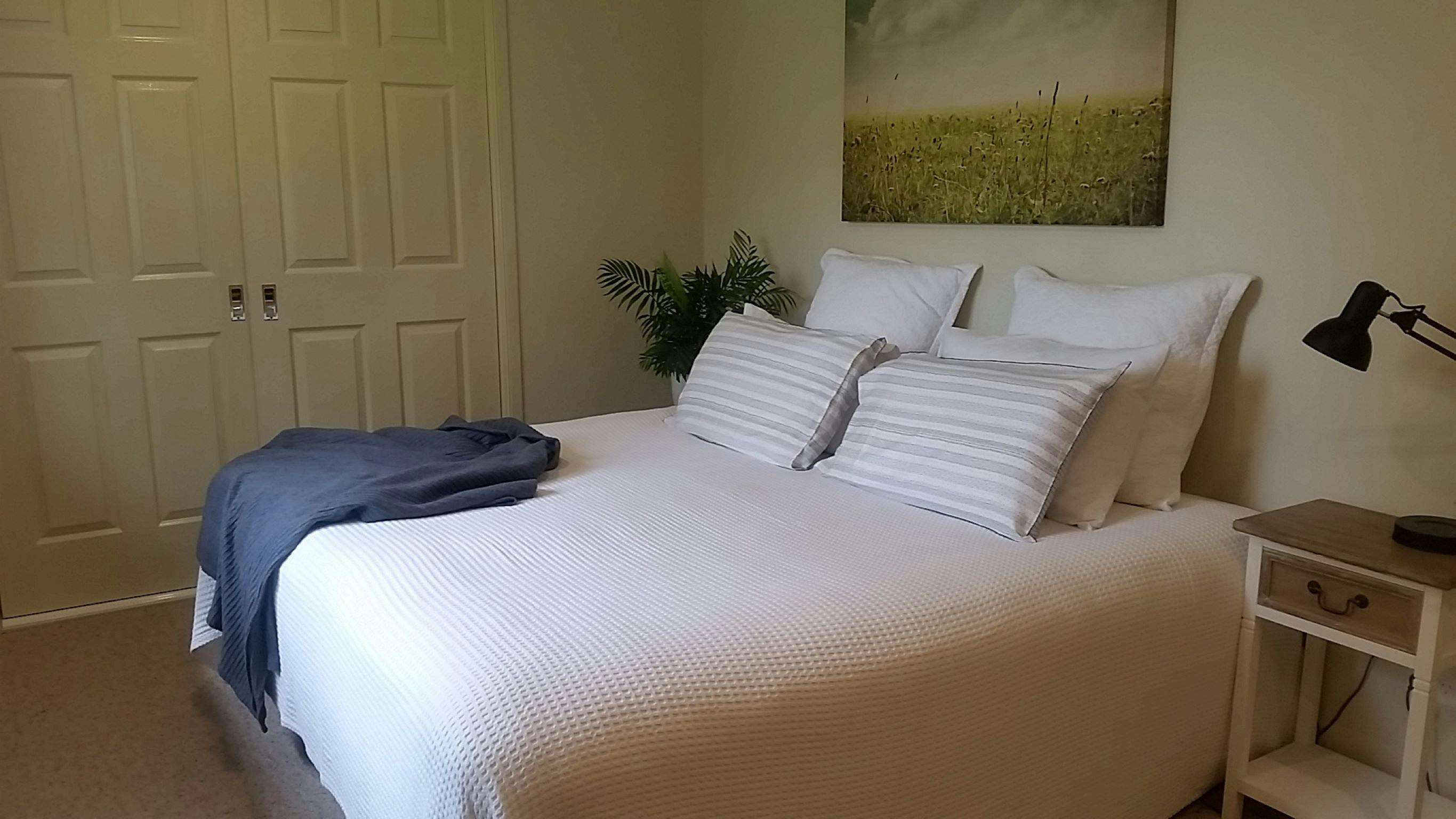 Bedroom two with a king bed that can be split into two singles