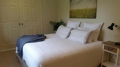 Bedroom two with king bed that can convert to two singles