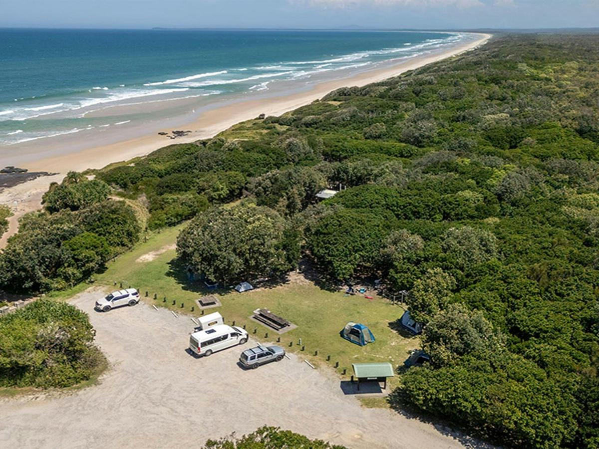Aerial view of the carpark, campground and beach at Mibanbah-Black Rocks campground. Credit: John