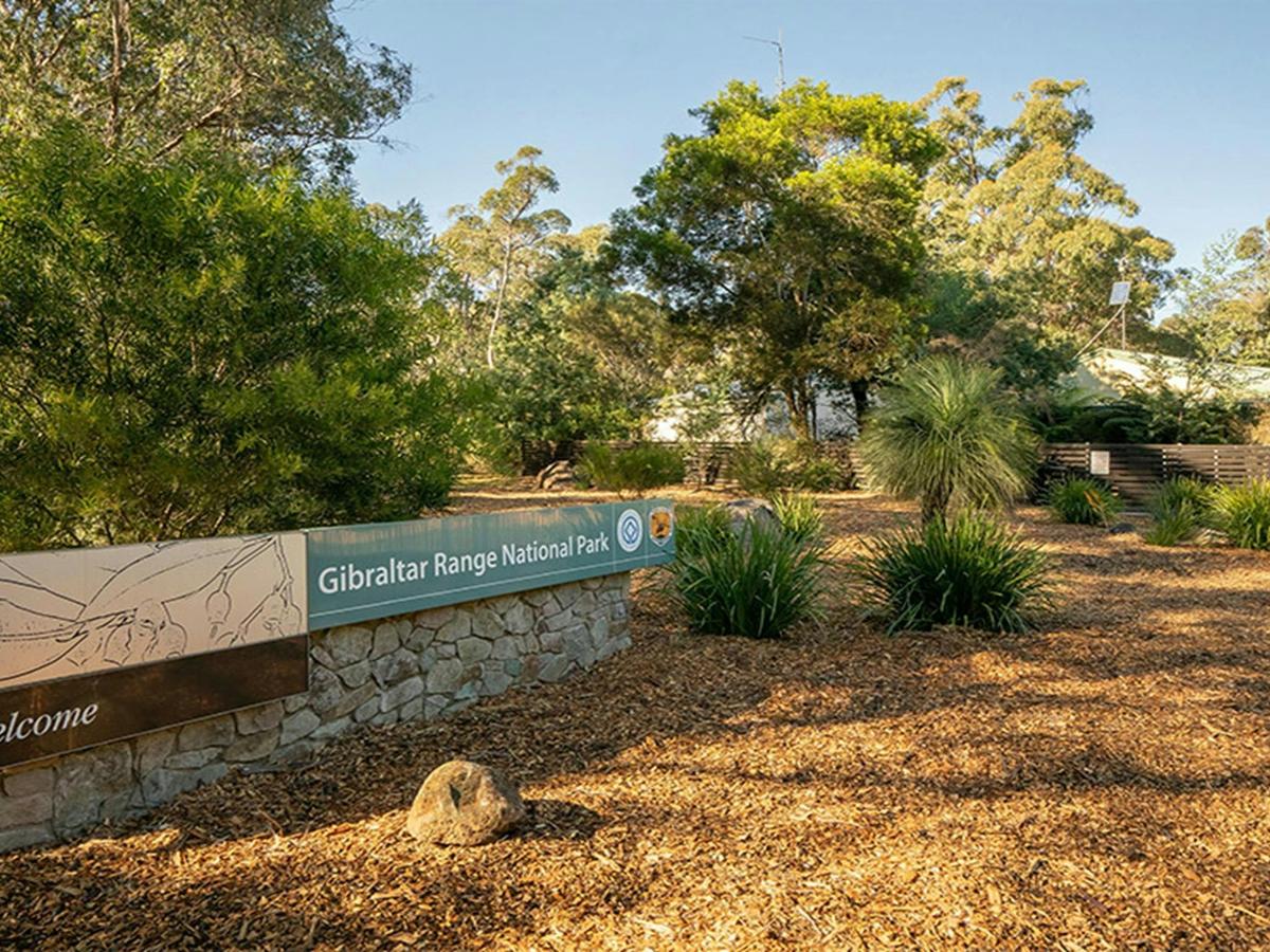 Park sign on entry to Mulligans campground. Photo: Robert John Spencer &copy; DCCEEW
