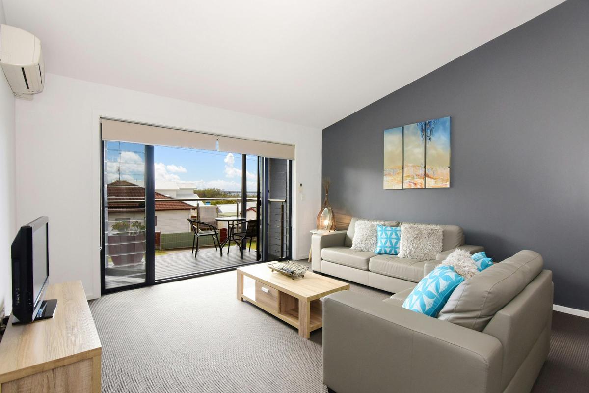 Lounge Room opening up onto small deck facing north