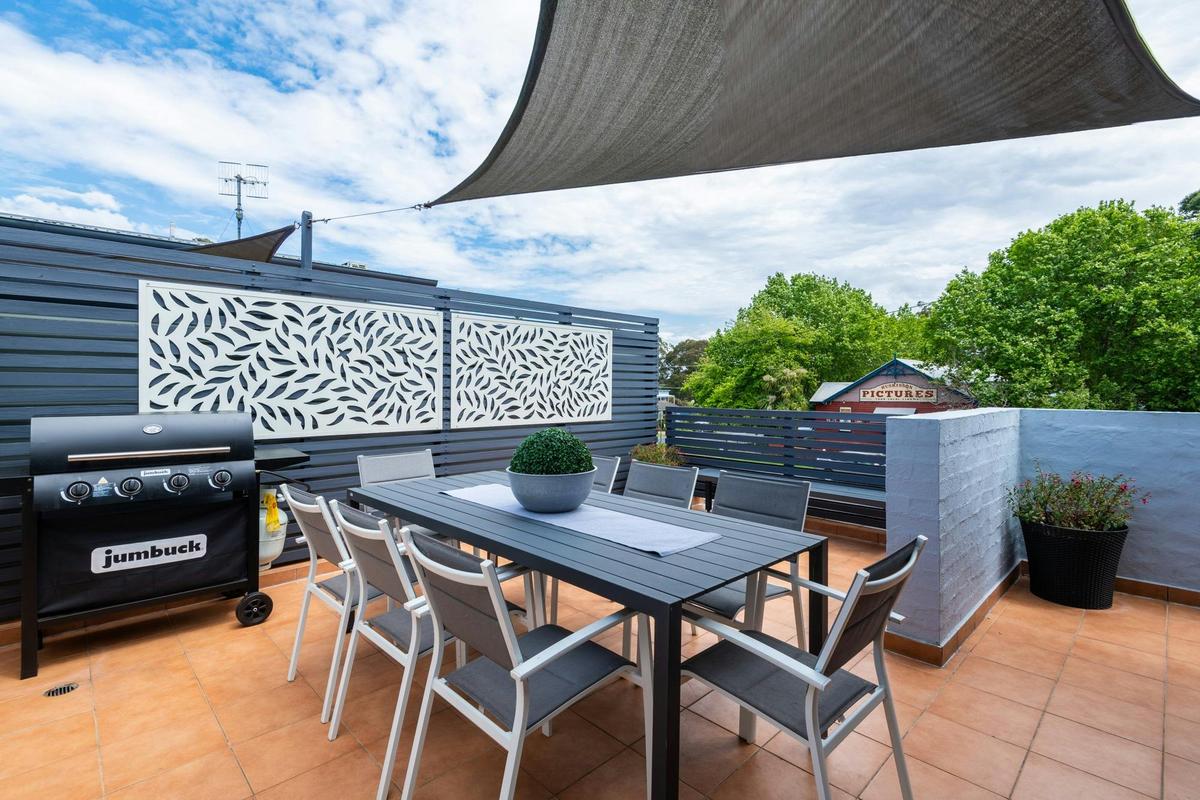 Private courtyard with BBQ and setting