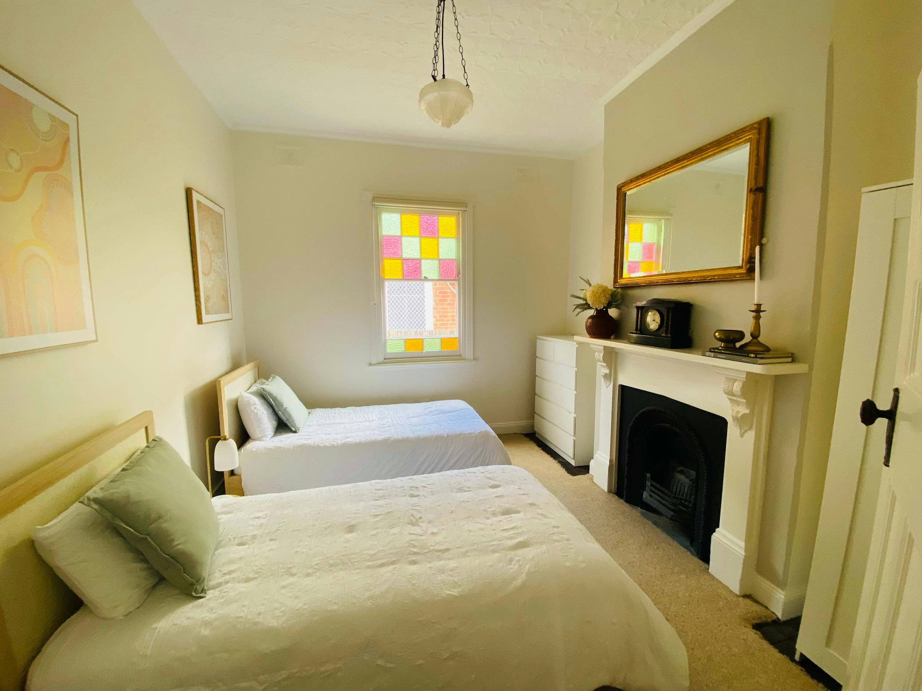 Bedroom with singles at Olde' Haven