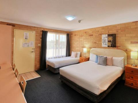 Standard twin room double bed and single bed