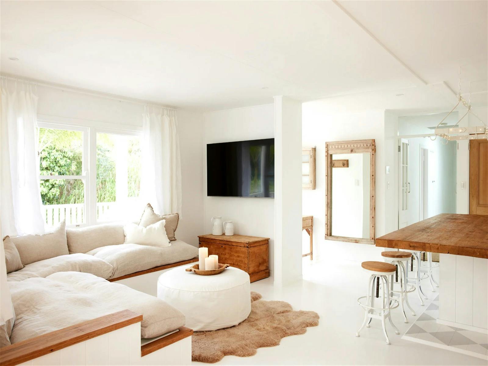 Spend for evenings in the games room with a bar fridge, designer ping pong table, lounges and a TV