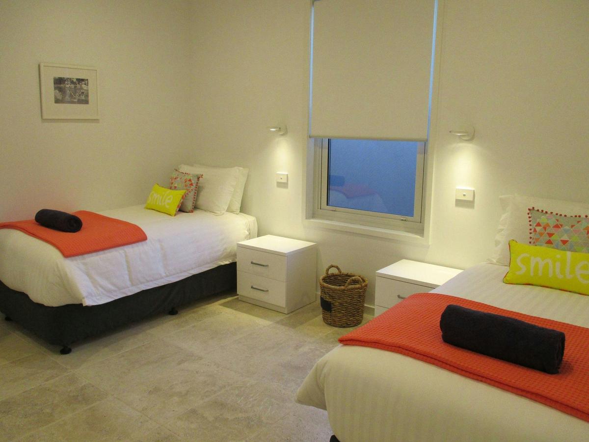 Two beds in each of the single rooms